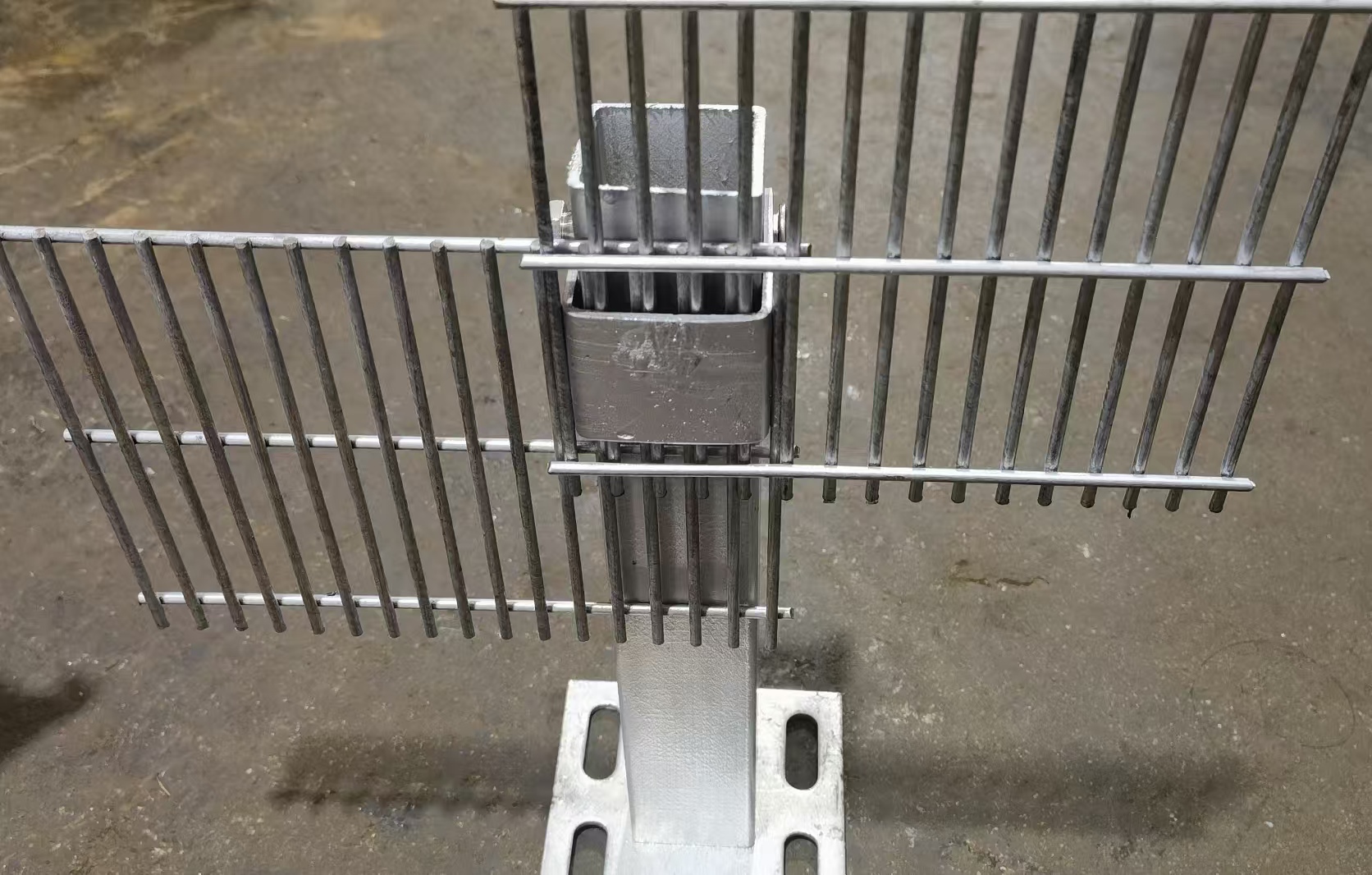 Concealed welded security fence connection
